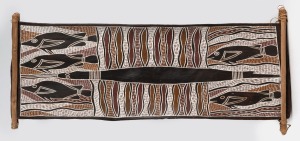 ARTIST UNKNOWN, (barramundi and eel), natural earth pigments on bark, remains of label and gallery number verso, 67 x 31cm overall