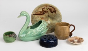 NELL HOLDEN green glazed pottery miniature vase with applied gumnuts and leaves, DISABLED SOLDIERS blue glazed pottery flower aid with incised cross mark, CHRISTINE A. PECKET pottery mushroom dish, rare STAN and GEOFF GILBERT brown glazed pottery mug with