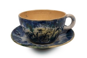 NEIL DOUGLAS and ARTHUR MERRIC BOYD pottery teacup and saucer with hand-painted kangaroos in landscape, signed "Arthur Merric Boyd, N. Douglas", the saucer 15.5cm diameter