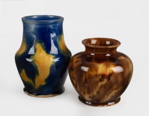 McHUGH two pottery vases glazed in blue and brown with yellow highlights, incised signatures to bases, 12cm and 9.5cm high