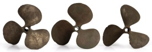 Three solid cast brass boat propellers, 20th century, the largest 29cm across
