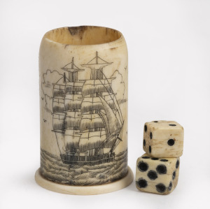 A scrimshaw whalebone dice and gaming cup, the cup 5.5cm high