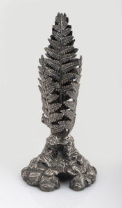 An antique silver plated epergne base with fern and rock decoration, 19th century, note: missing trumpet piece. 23cm high.