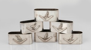A set of six Australian silver plated napkin rings decorated with boomerangs and native animals, early 20th century, 7cm wide.
