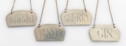Four assorted Australian silver decanter labels, including Whisky, Sherry, Brandy and Gin, 20th century, stamped "Silv." or "Stg. Sil.", 4cm wide