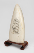 JAMES CUMBERLAND BROWN (Albany, Western Australia) scrimshaw whale's tooth with tallship portrait, mounted on later timber stand, signed "J.F.C. RMS", the tooth 12.5cm high, 14cm high overall including stand