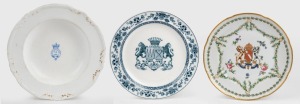 Three antique English porcelain plates and bowls: I.) Duke of Norfolk (Howard), antique Armorial plate, 23cm wide, II.) 6th Dragoon Guard, 19th century mess bowl by Cullum & Sharpus, 25cm wide, III.) An antique Armorial plate by the noted English factory 