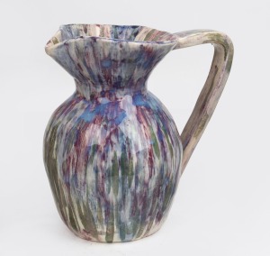 UNA DEERBON pottery jug with unusual burgundy, purple and green speckled glaze incised "Deerbon", 22cm high, 22cm wide.