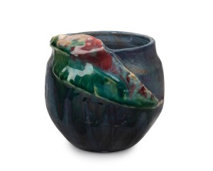 PHILIPPA JAMES mauve glazed pottery vase with blue interior and high gloss green applied gum leaf decoration highlighted in burgundy, incised "Philippa James", 13cm high.