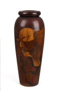 An Australian huon pine pokerwork vase decorated with kookaburra and gum leaves, circa 1925, 35.5cm high.