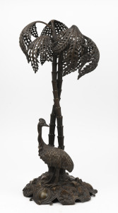 An antique cast bronze table centrepiece with rare cassowary base, engraved with monograms and dated Nov. 15th, 1871", 55cm high.