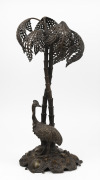 An antique cast bronze table centrepiece with rare cassowary base, engraved with monograms and dated Nov. 15th, 1871", ​​​​​​​55cm high.