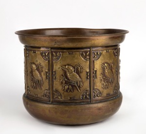 An antique embossed brass jardiniere with kookaburras, gumnuts and gum leaves, 19th/20th century, 20cm high, 27cm diameter.