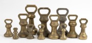 BELL WEIGHTS twelve assorted cast brass examples, some with Government Broad Arrow stamp, ranging from 7lb to 8oz, (three part sets), 19th century.