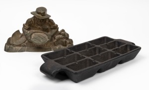 A cast iron 9 bar ingot mould; together with a "BALLARAT" vintage doorstop with gold mining motif, (2 items), ​​​​​​​the mould 43cm wide.