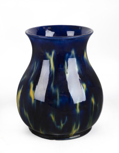 McHUGH blue glazed baluster shape pottery vase with yellow highlights, incised "H. McHugh", 23.5cm high.