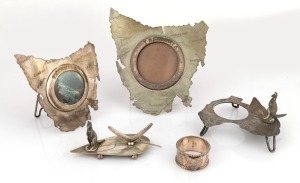 Antique Australian silver plated knife rest, picture frames, ink stand and napkin ring, all with Australian motifs, 19th/20th century, (5 items), ​​​​​​​the largest 17cm high.