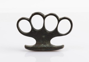 114 · Police issue knuckle duster with registration No.741283, circa 1929, 9.5cm wide.