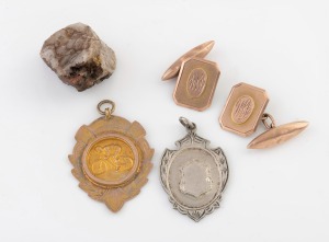 An antique 9ct gold cycling fob, a pair of 9ct gold cufflinks, and sterling silver fob, and a natural quartz gold ore specimen, 9.3 grams of 9ct gold total.