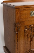 ROBERT PRENZEL antique Australian oak single pedestal hall table with carved waratah decoration to the corners and gumnut and gum leaf carving to the stippled panel door, original nickle plated hardware, tapering legs and lower footrest shelf, the side of - 3