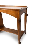 ROBERT PRENZEL antique Australian oak single pedestal hall table with carved waratah decoration to the corners and gumnut and gum leaf carving to the stippled panel door, original nickle plated hardware, tapering legs and lower footrest shelf, the side of - 5