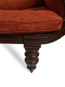 An early Colonial Australian cedar chaise lounge with cross-banded and carved facings, reeded blocks and paterae, vase turned legs with original brass castors, and very rare original leather strapping, Northern Tasmanian origin, circa 1830, - 3