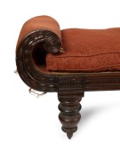 An early Colonial Australian cedar chaise lounge with cross-banded and carved facings, reeded blocks and paterae, vase turned legs with original brass castors, and very rare original leather strapping, Northern Tasmanian origin, circa 1830, - 5