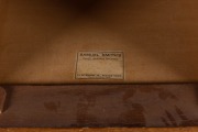 An antique Australian cedar chest of eight drawers with handsomely carved corbels and cross banded edge, top drawer with secret locking mechanism, 19th century, paper label affixed to the carcass beneath the hat drawer "FROM SAMUEL SMITH'S CABINET, UPHOLS - 2