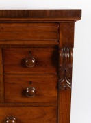 An antique Australian cedar chest of eight drawers with handsomely carved corbels and cross banded edge, top drawer with secret locking mechanism, 19th century, paper label affixed to the carcass beneath the hat drawer "FROM SAMUEL SMITH'S CABINET, UPHOLS - 3