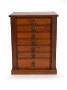 An antique Australian stained kauri pine seven drawer miniature stationary chest in the Wellington style, 19th century, 54cm high, 43cm wide, 33cm deep. - 3