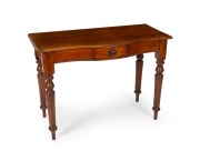 An antique Australian cedar single drawer hall table with serpentine front, circa 1880, 76cm high, 106cm wide, 50cm deep