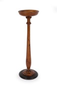 An Australian pokerwork stand decorated with gum blossoms and leaves, circa 1925, ​​​​​​​73cm high.