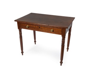 A Colonial Australian cedar single drawer hall table with scratch cock-beaded moulding and brass handles and finely turned mirrored vase tapering legs, Sydney origin, circa 1835, 74cm high, 93cm wide, 58cm deep.