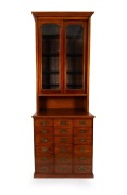 CROWN STREET, WOMEN'S HOSPITAL (SYDNEY). Colonial Australian cedar bookcase fitted with numerous drawers (some of them double depth), circa 1870. The Crown Street Women's Hospital located in Surry Hills, Sydney was a key maternity hospital for over 90 yea