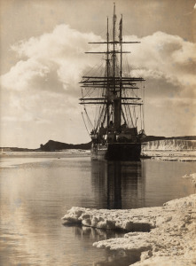 TERRA NOVA EXPEDITION: Original silver gelatin photograph, 12 x 16.5cm, numbered '132' in pencil in Herbert Ponting's hand, known to have been titled by Ponting "Terra Nova at ice-foot. Barne Cape and glacier in background. Jan. 15th 1911".