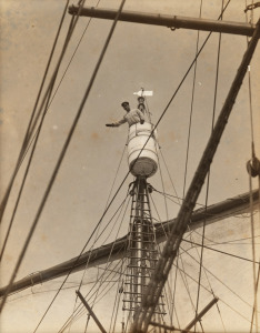 TERRA NOVA EXPEDITION: Original silver gelatin photograph, 9.5 x 11.5cm, numbered 'A217' in pencil in Herbert Ponting's hand, known to have been titled by Ponting "Lieut Evans commanding the Terra Nova from the crow's nest".
