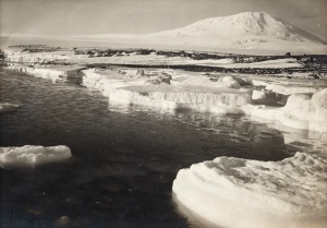 TERRA NOVA EXPEDITION: Original silver gelatin photograph, 16.5 x 11.5cm, numbered '221' in pencil in Herbert Ponting's hand, known to have been titled by Ponting "Young pancake ice forming at West Beach. Erebus in background. March 9th 1911".