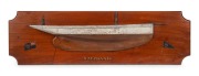 "STEPHANIE" half hull boat model, hardwood and pine with hand-painted finish, Royal Prince Alfred Yacht Squadron, Sydney, 1910, ​​​​​​​26 x 86cm.