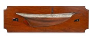 "MONARA 1" half hull model boat in cedar, pine and Australian hardwood with hand-painted highlights, Royal Prince Alfred Yacht Squadron, 1910, ​​​​​​​28 x 85cm.