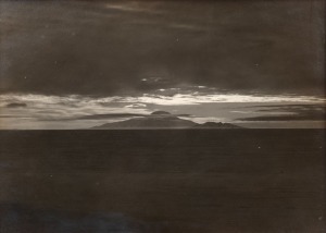 TERRA NOVA EXPEDITION: Original silver gelatin photograph, 16.5 x 11.5cm, numbered '394' in pencil in Herbert Ponting's hand, known to have been titled by Ponting "Midnight Sun effect on Mount Discovery (taken from 1 mile South of Razorback at 11pm). Nove