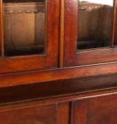 A Colonial Australian cedar two door bookcase in the Gothic style with adjustable shelves, astragal glazed upper doors and blind panel lower doors, Tasmanian origin, circa 1845, 250cm high, 100cm wide, 50cm deep. - 2