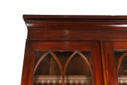 A Colonial Australian cedar two door bookcase in the Gothic style with adjustable shelves, astragal glazed upper doors and blind panel lower doors, Tasmanian origin, circa 1845, 250cm high, 100cm wide, 50cm deep. - 3