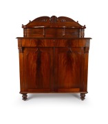 An antique Australian cedar chiffonier with shield doors, turned column supports and cross-banded top shelf, Tasmania origin, circa 1850, unusually large proportions of 153cm high, 122cm wide, 53cm deep.