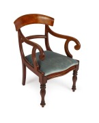 An antique Australian cedar spade back carver chair with drop in seat, serpentine front rail and faceted legs, New South Wales origin, circa 1850, 50cm across the arms