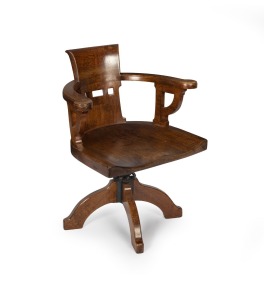STATE LIBRARY OF VICTORIA antique silky oak revolving armchair from the famed reading room, 19th century, 62cm across the arms