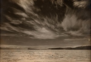 TERRA NOVA EXPEDITION: Original silver gelatin photograph, 16.5 x 11.5cm, numbered '458' in pencil in Herbert Ponting's hand, known to have been titled by Ponting "Beautiful Cirrus Clouds, over the Barne Glacier. December 19th 1911".