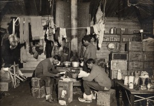 TERRA NOVA EXPEDITION: Original silver gelatin photograph, 16.5 x 11.5cm, numbered '187' in pencil in Herbert Ponting's hand, known to have been titled by Ponting "Nelson, Day and Lashly in E.H. Shackleton's hut. Feb. 17th 1911.".