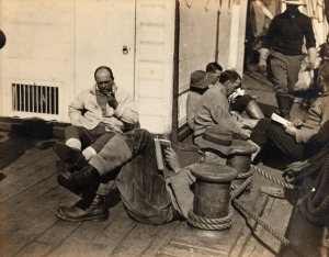 TERRA NOVA EXPEDITION: Original silver gelatin photograph, 12 x 9.5cm, numbered 'A194' in pencil in Herbert Ponting's hand, known to have been titled by Ponting "Group in the Terra Nova. December 1910".