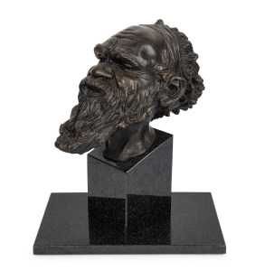 244 · ARTIST UNKNOWN, Aboriginal man, cast bronze and marble, signed (illegible), 42cm high.
