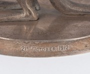 WILLIAM DRUMMOND & Co. Australian sterling silver kangaroo statue on oval plinth, engraved "21st OCTOBER, 1912", stamped "STG. SILVER, W.D. & Co.", 10.5cm high, 409 grams (including weighted base). - 2